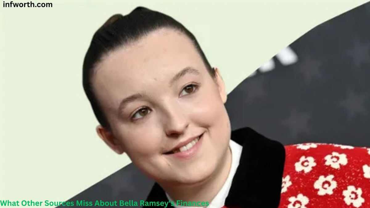 Bella Ramsey smiling at a public event while wearing a red floral jacket, featured in an article about Bella Ramsey Net Worth, career earnings, and financial success.