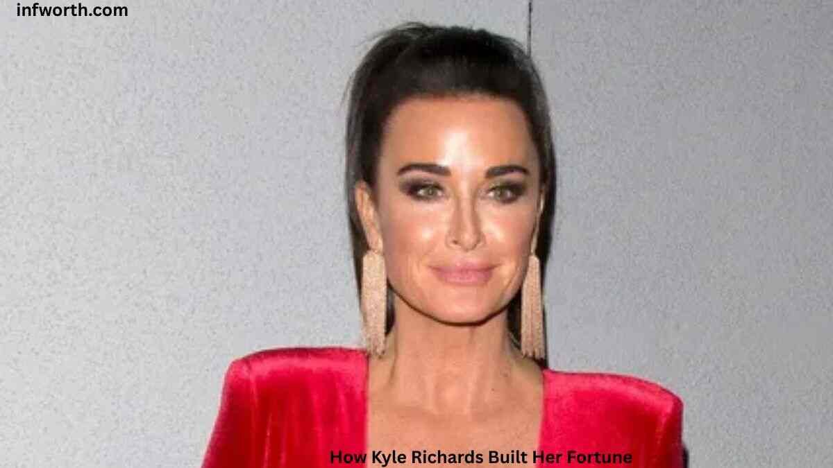 Kyle Richards wearing a red dress at a public event, featured in an article about Kyle Richards Net Worth.