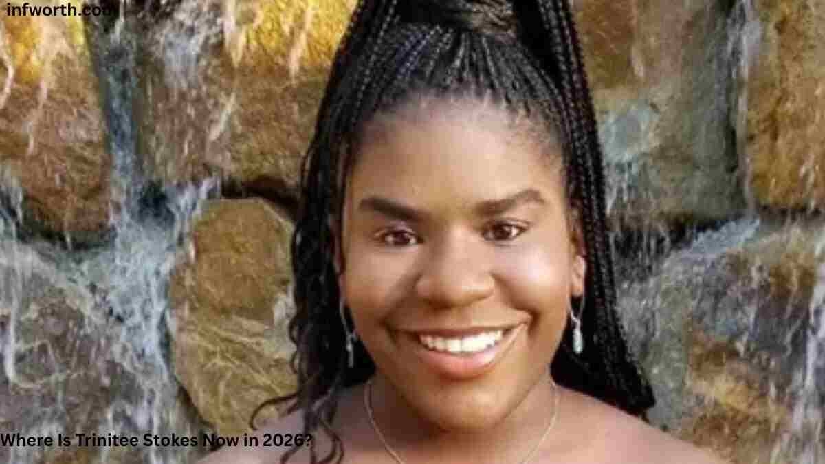 Trinitee Stokes smiling in front of a waterfall in 2026 – Trinitee Stokes Net Worth