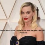 Margot Robbie at a red carpet event for an article about Margot Robbie Net Worth in 2026.