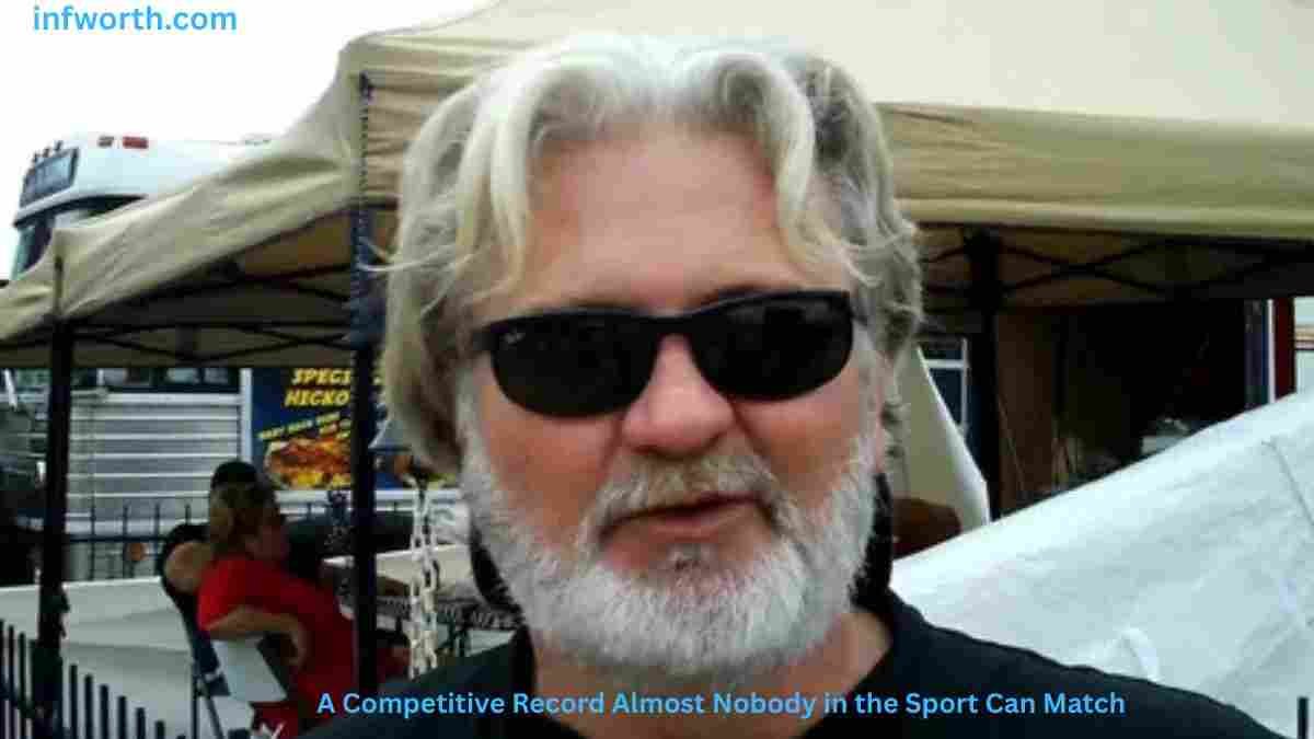 Myron Mixon Net Worth at a BBQ competition wearing sunglasses