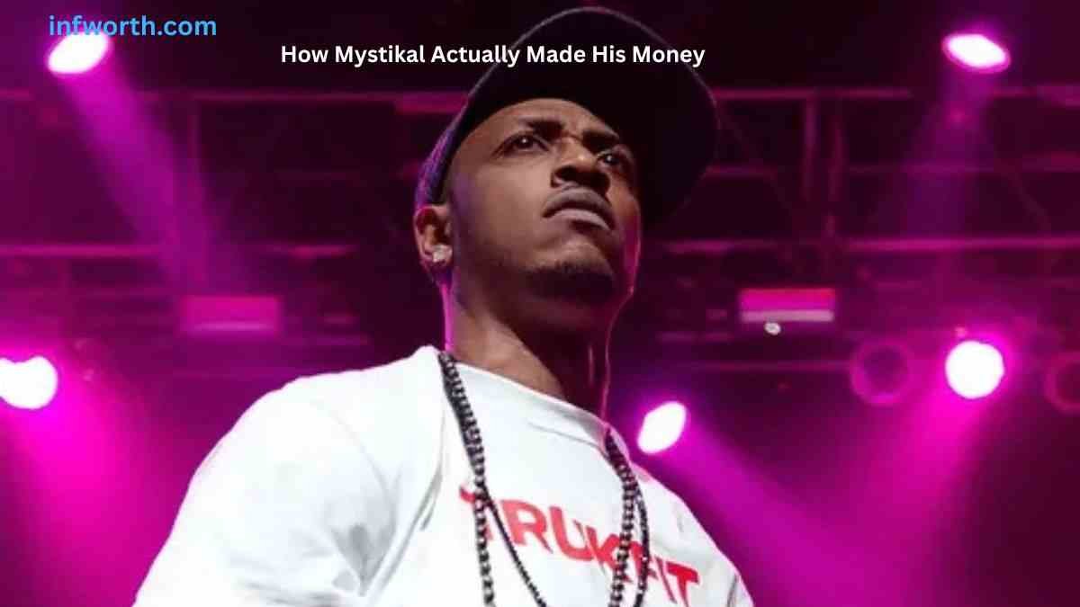 Mystikal performing on stage under purple lights, featured in a Mystikal Net Worth article.