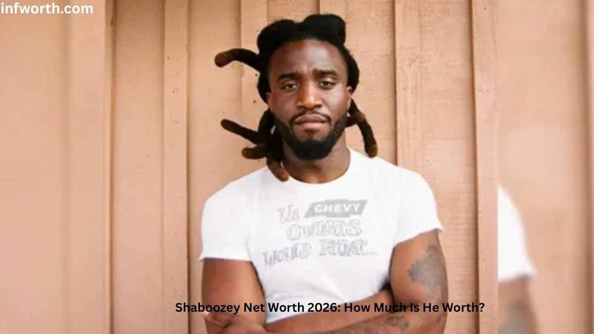 Shaboozey Net Worth – Shaboozey posing in a white T-shirt during the rise of his successful music career in 2026.