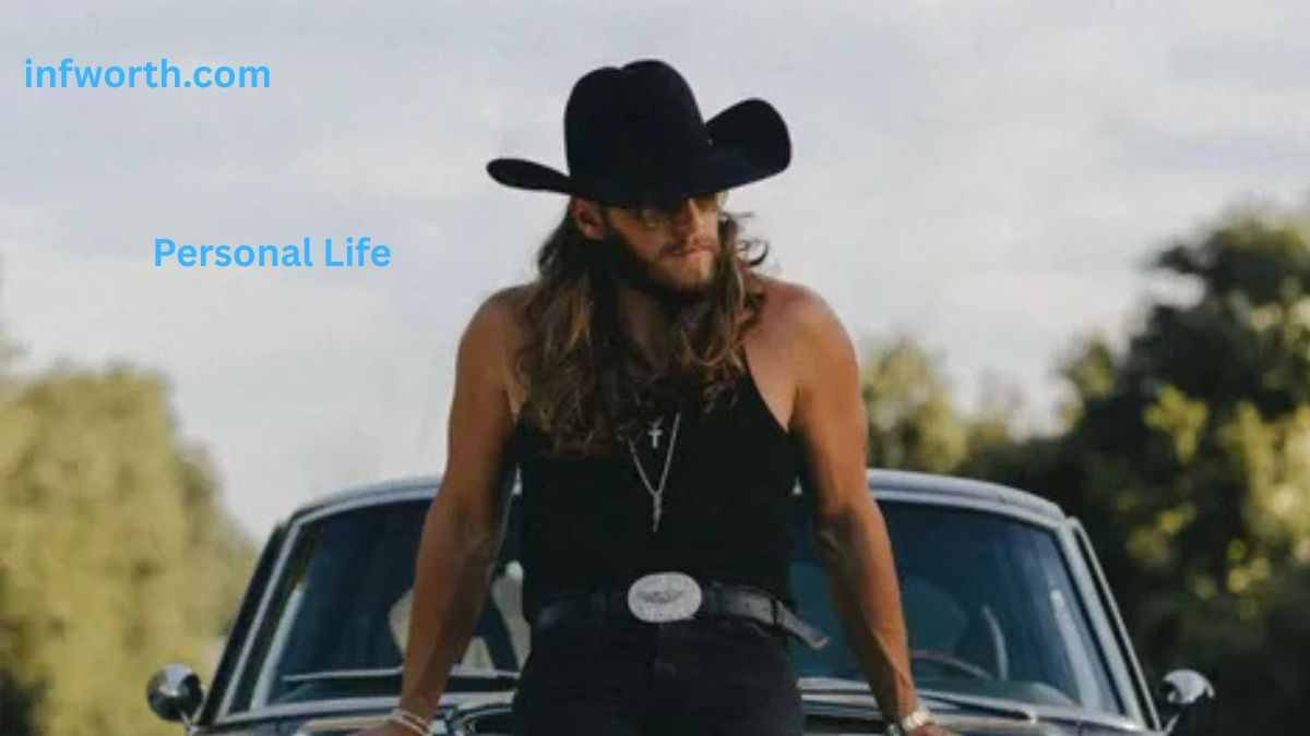 Warren Zeiders in cowboy hat standing in front of a vintage car – Warren Zeiders Net Worth