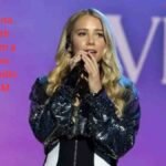 Avery Anna Net Worth 2026 singer performing on stage at an ACM event